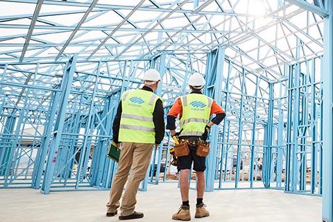 builders looking at LGS frames