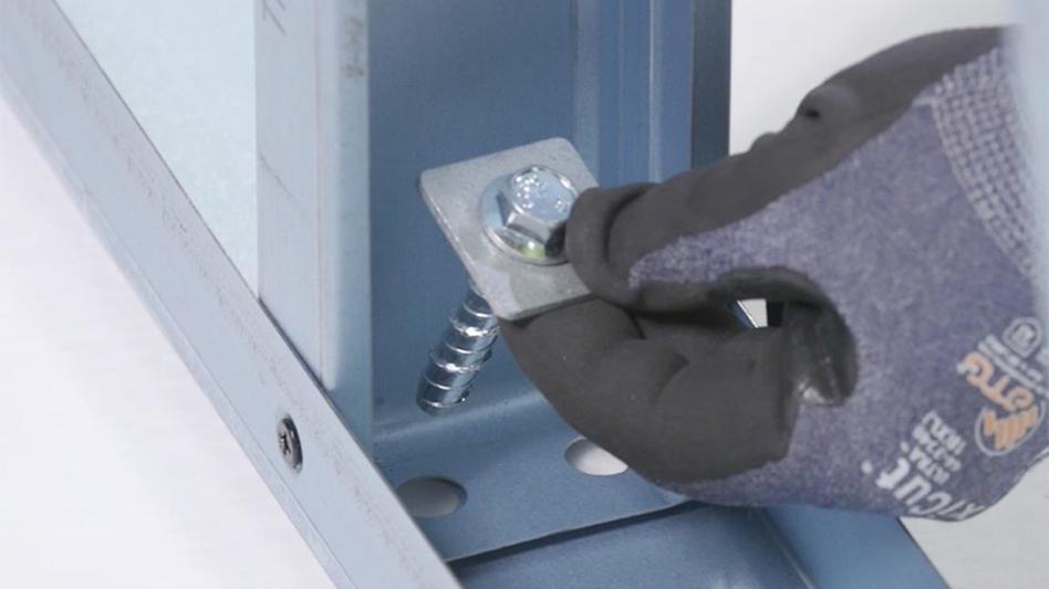 A closeup of a fastener in an LGS frame